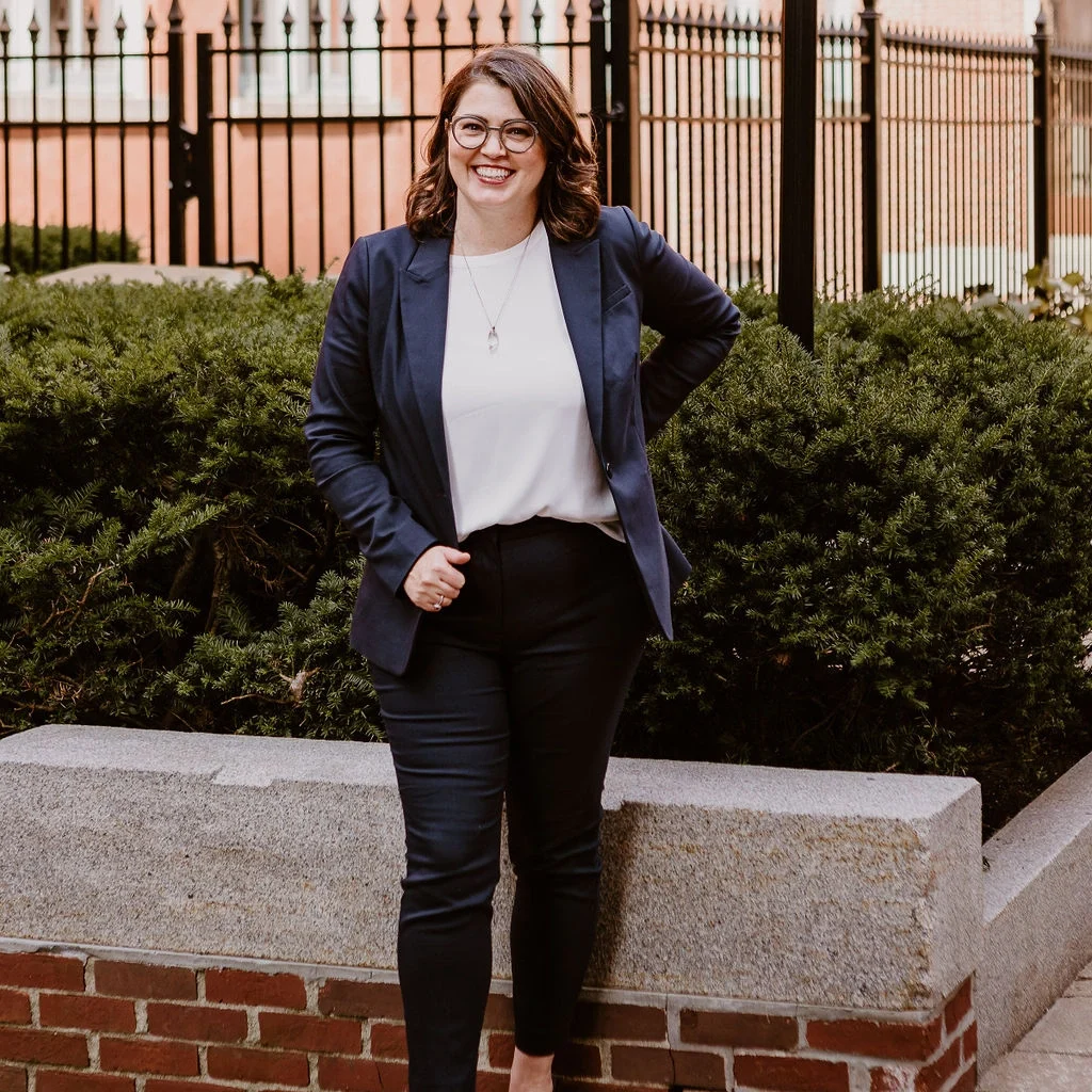 Erica Waddell, marketing strategist and founder of Post Road Marketing, standing outdoors in downtown Saint John NB